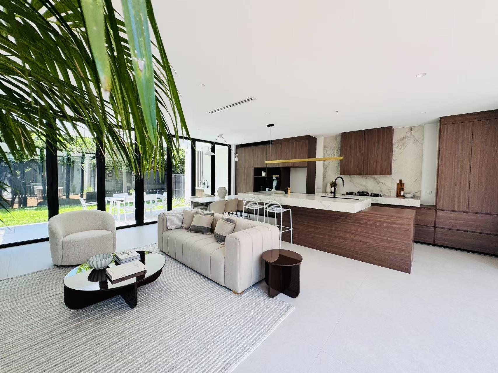 Open-plan living space with full-height glazing to the garden